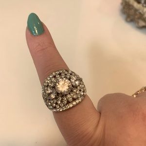 Very beautiful silver with crystal stones. Size 9